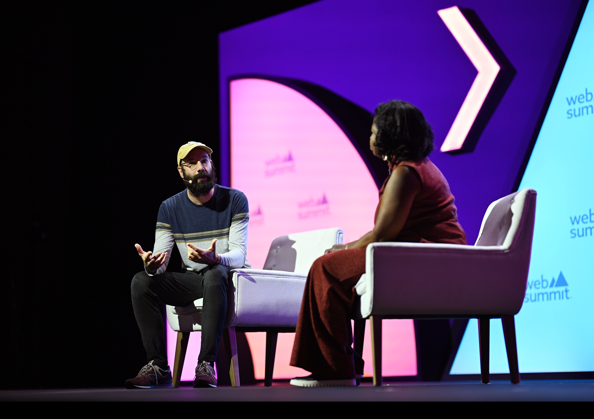 Jack Conte, Co-founder and CEO, Patreon; left, and Nekesa Mumbi Moody, Co-Editor-in-Chief, The Hollywood Reporter; on New Media Summit Stage during day one of Web Summit 2024 at the MEO Arena in Lisbon, Portugal.